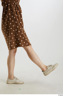 Aera  1 brown dots dress casual dressed flexing leg…